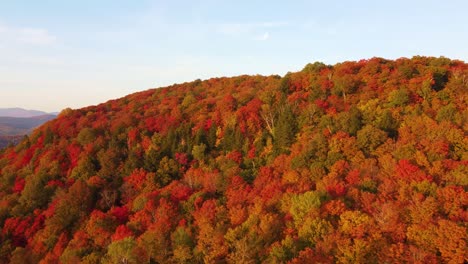 Aerial-view-of-a-mountain-ridge-covered-in-autumn-foliage