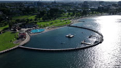 Drone-track-around-man-made-beach