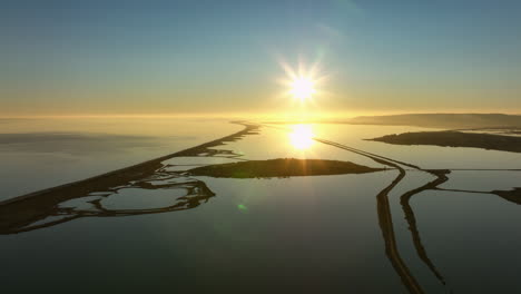 Aerial-view:-golden-Mediterranean-coast-and-road.