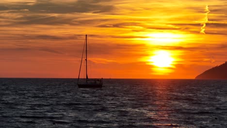 yacht sailing in the sunset