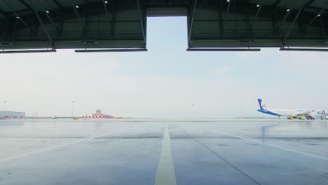 empty airport runway with aircraft