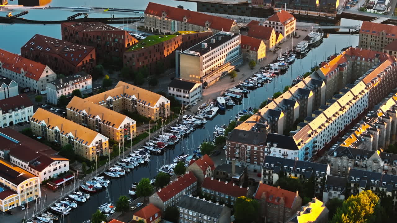 Aerial drone view of the city centre of the Copenhagen canals in Denmark at sunset