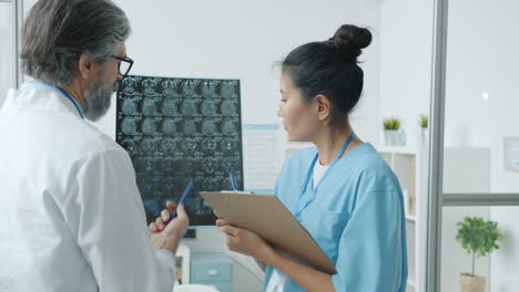 doctor and nurse reviewing medical images