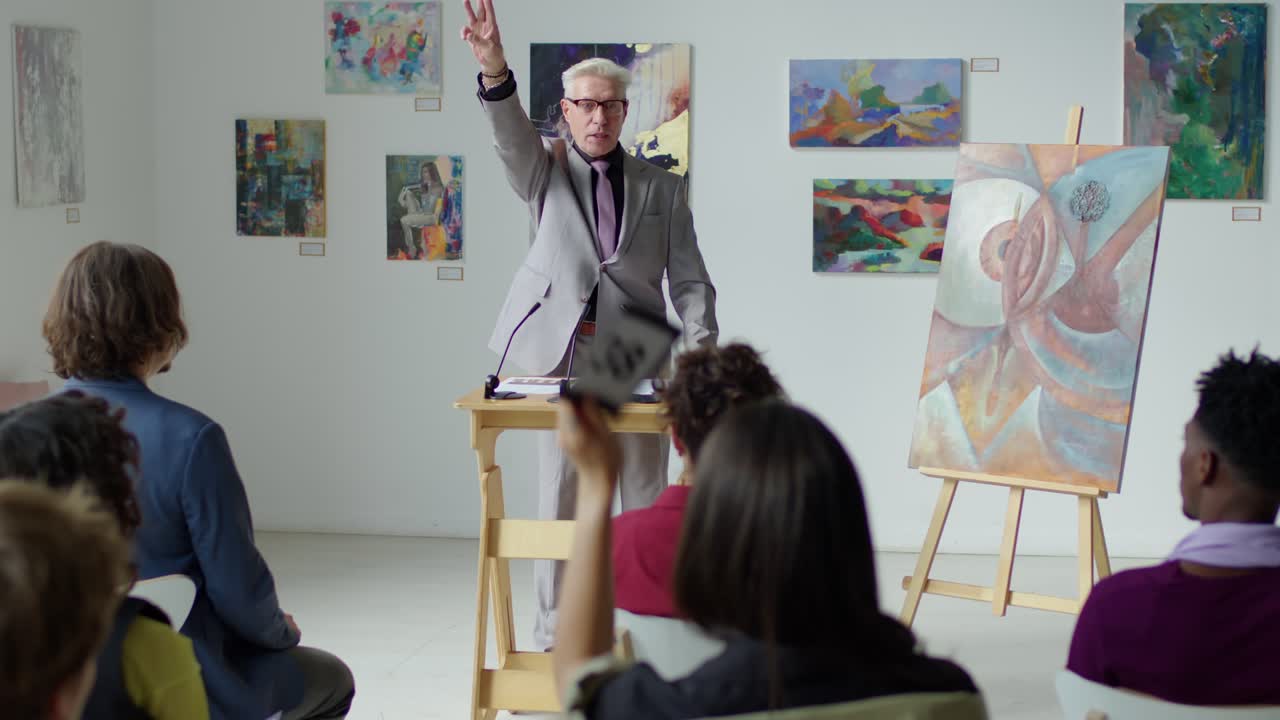 Auctioneer Selling Artwork on Auction