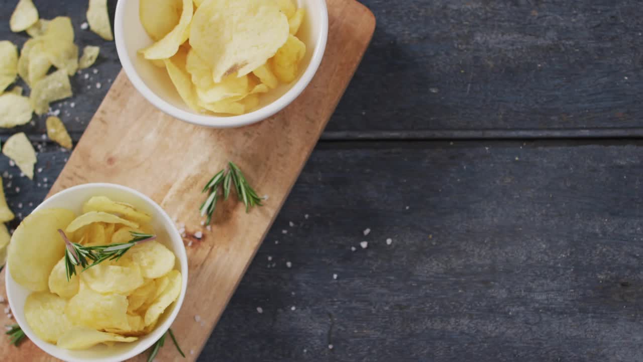 Bokeh circles fading in drifting over chip bowls while triangle lights pulsing to highlight chips