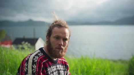 bearded man eating fresh bush vetch