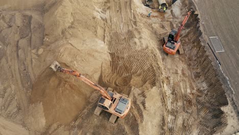 aerial view of a working excavator in the mine