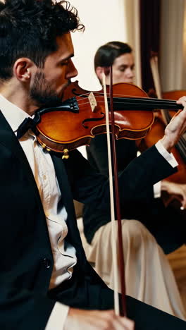 string quartet performance in a grand hall