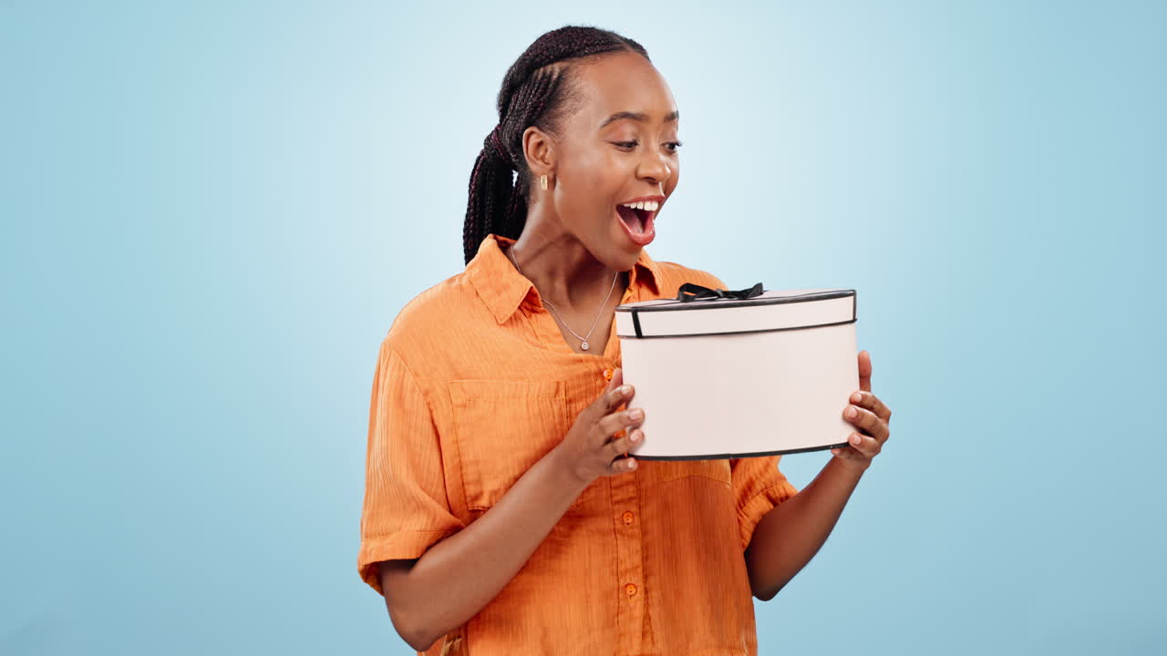 Surprise, gift and black woman with celebration