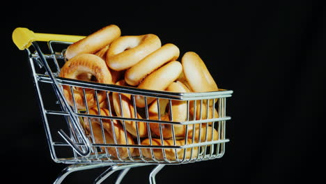 Small-Bagels-In-A-Shopping-Trolley-In-Miniature-4k-Video