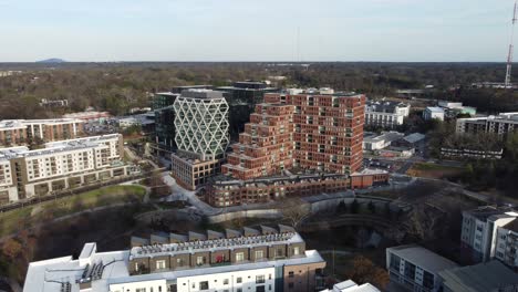 drone shot rotating around new buildings built on the belt line