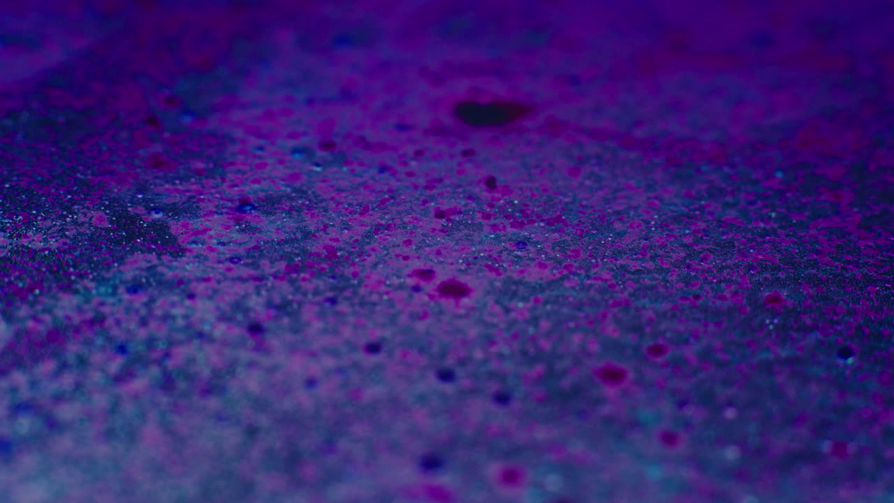 Colourful, organic, liquids macro shots buzzing and flowing