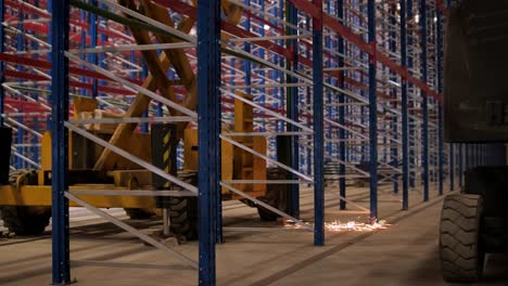 big and modern warehouse under construction, featuring metal shelving and other industrial equipment.