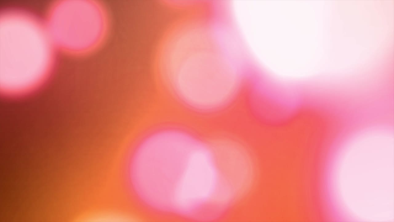 el fondo de las luces del círculo bokeh. desfocalizado de las llamaradas de fuga de luz. animación de imágenes en 4k