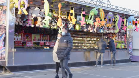 carnival game stall with customers