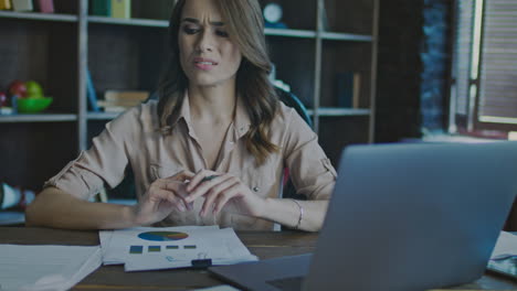 upset woman reading market research document