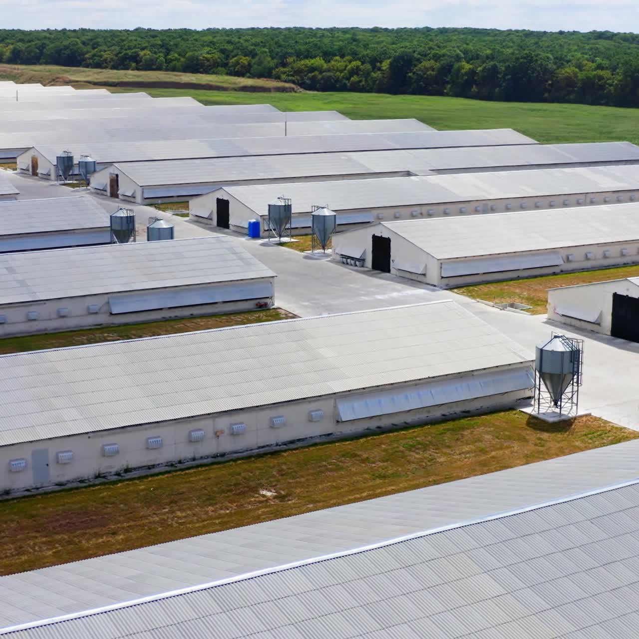 A modern, metal, prefabricated farm building. Prefabricated farm building. View from above on poultry farm