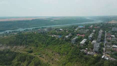 view-of-the-Rezina-city-on-the-edge-of-the-gorge-smooth-movement-from-the-side-with-a-view-of-the-city-and-the-river