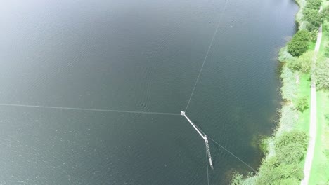 aerial drone shot of a pulling system at a bend for waterboarding