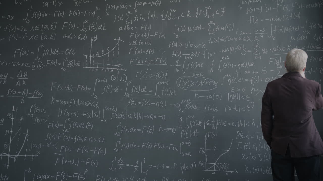 Professor Explains Mathematical Concepts on a Blackboard