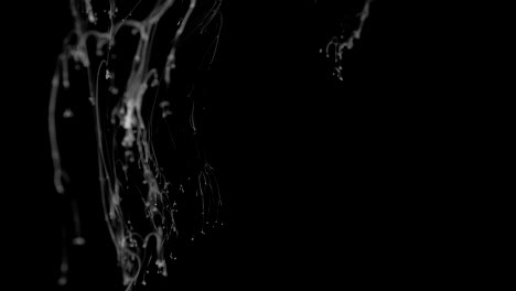 white ink effect in water filmed on black background. abstract ink creating wonderfully unique cloud formations. filmed in 4k