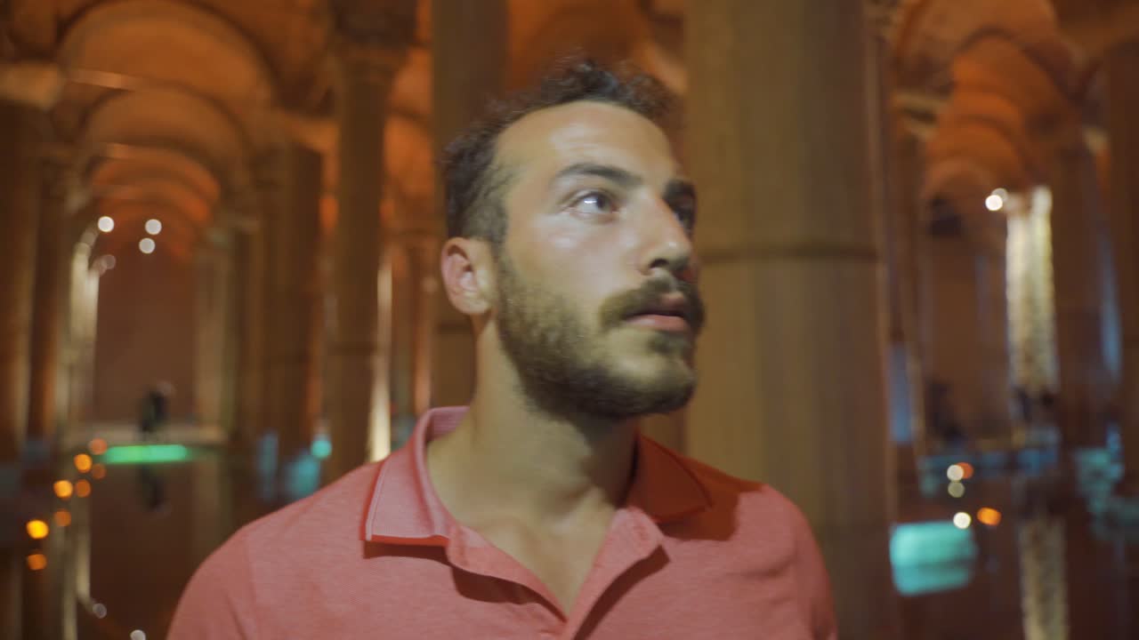 Man looking around in mysterious place.