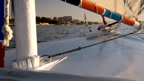 nile sail boat on the nile in luxor at sunset in the beautiful and historic egypt