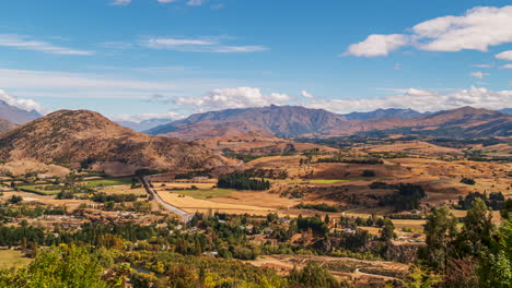 Cloud-shadows-pass-over-New-Zealand-landscape-near-Queenstown,-timelapse