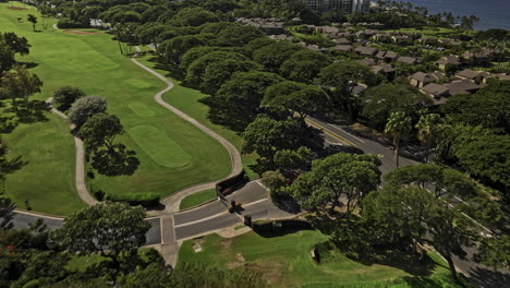 wailea-makena maui hawaii aerial v16 flyover golf course nestled within a residential area, oceanfront luxury homes and resorts, views of ulua and mokapu beach - shot with mavic 3 cine - december 2022