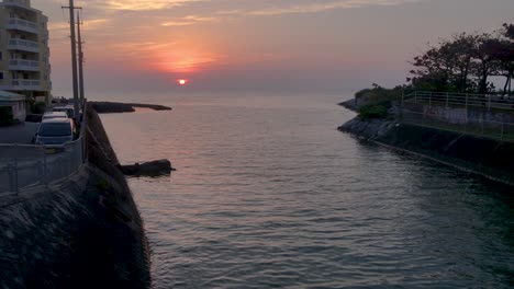 timelapse, tide rolling into river mouth at sunset