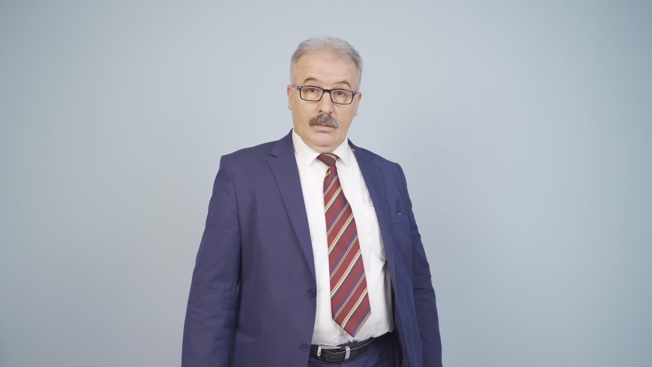 Businessman saying wow to camera.