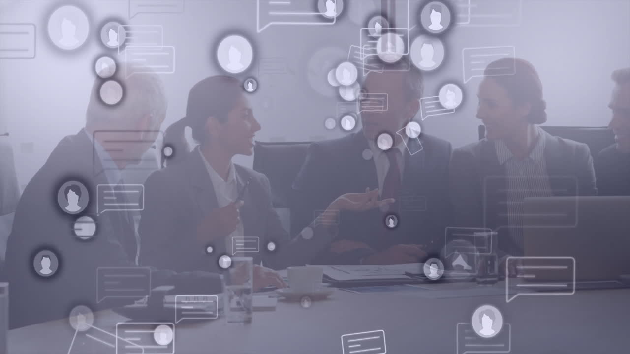 In office, diverse professionals using digital communication icons during business meeting