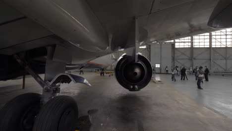 airplane in repair hangar