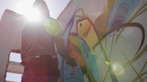 graffiti artist looking at wall in the sunshine 4k