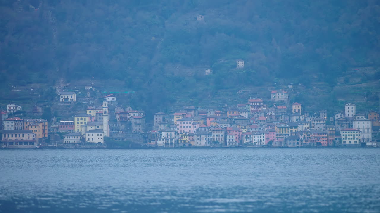 Town surrounded by mountains in Lake Como, Italy