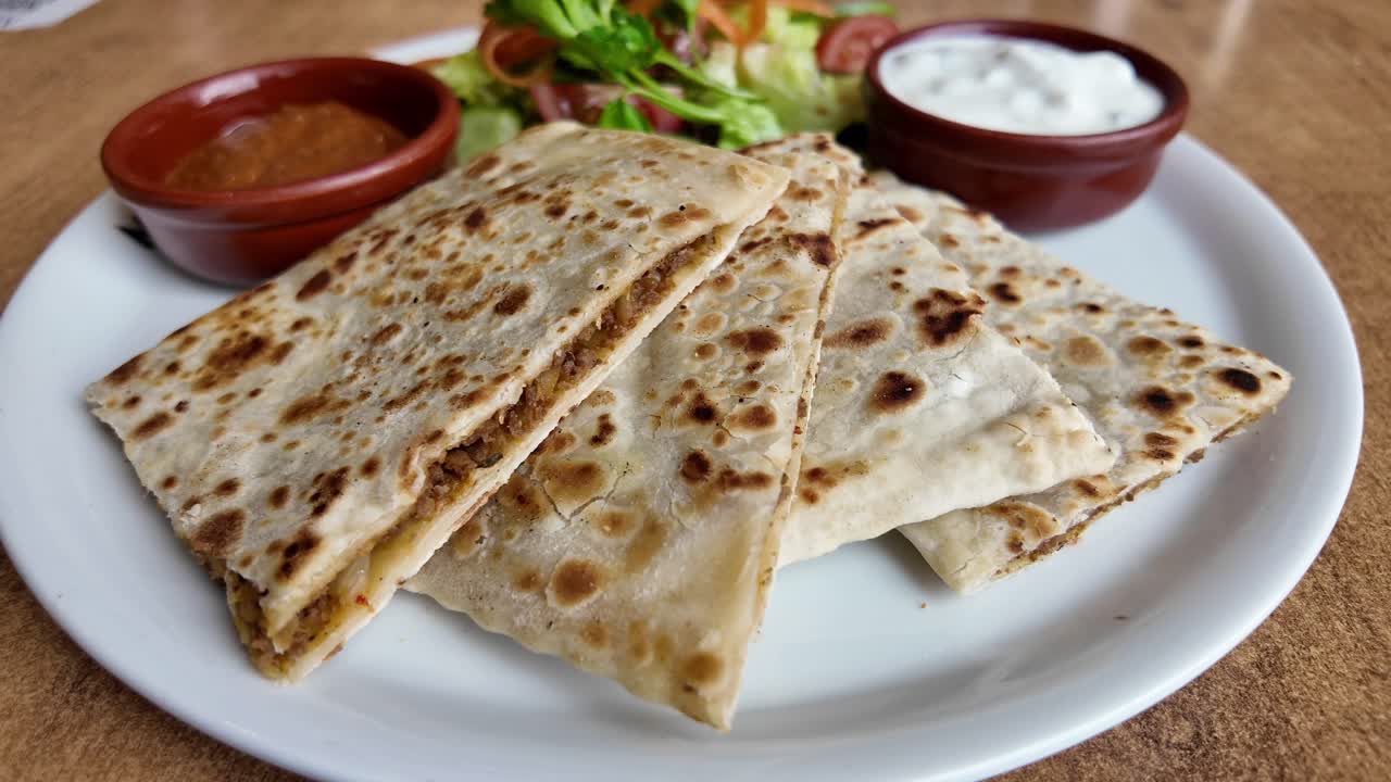 Savory Flatbread Meal with Salad and Dips