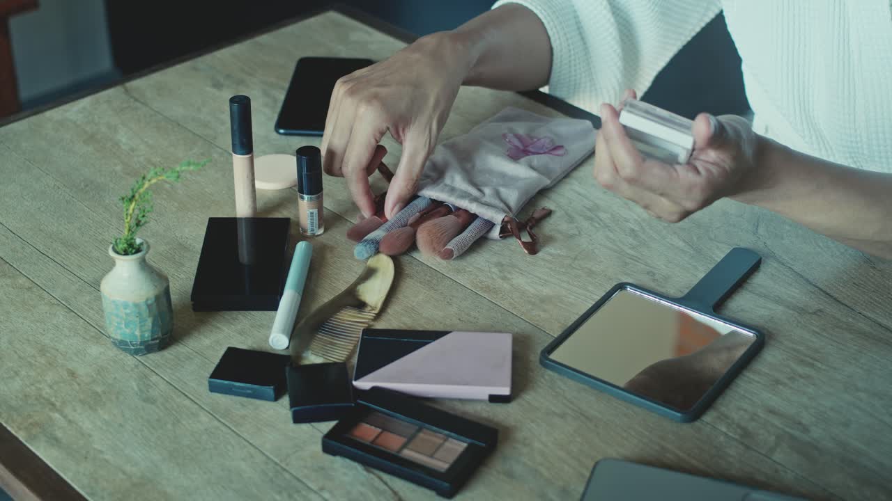Woman getting ready with makeup
