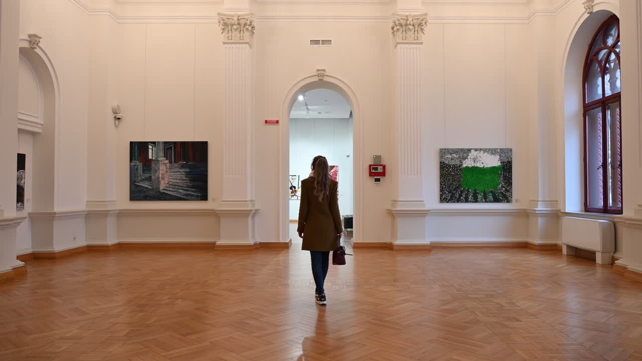 CHISINAU, MOLDOVA - OCTOBER 18, 2021: Woman visitor at National Art Museum of Moldova