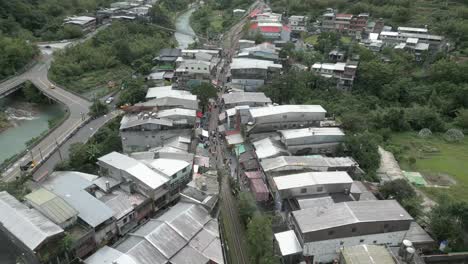 aerial view of a village nestled in a mountain valley