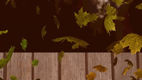 animación digital de múltiples hojas de otoño flotando sobre la superficie de madera contra el bosque