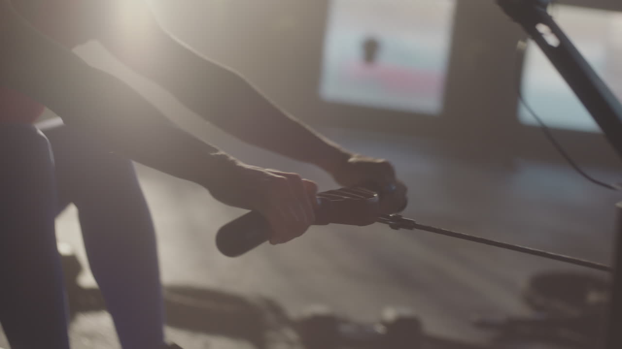 Woman Rowing Machine Workout