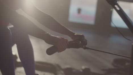 woman rowing machine workout