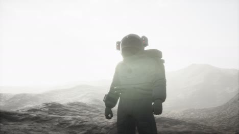 astronaut on another planet with dust and fog