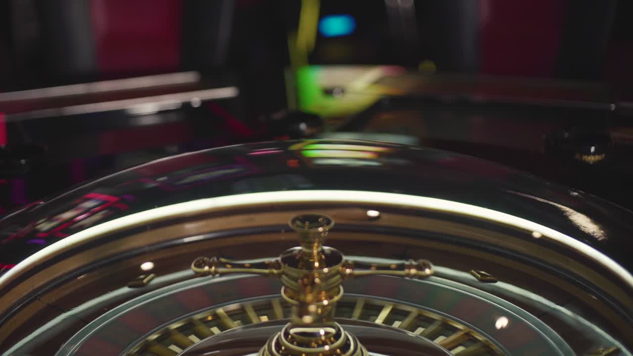 The roulette casino wheel is spun one way and a ball is sent round the other way