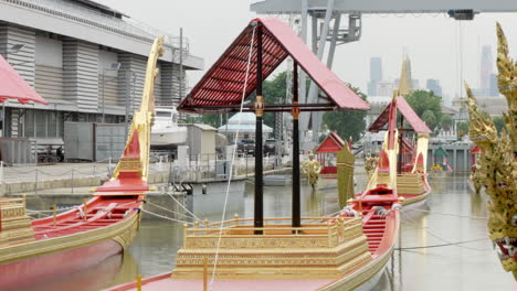 a collection of suphannahong royal barges displayed at the national museum, near the chao phraya river in bangkok, thailand