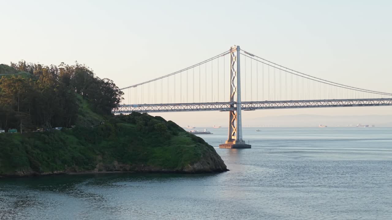 An aerial drone panning view of the San Francisco Bay Bridge from Treasure Island. Shot in 4K.