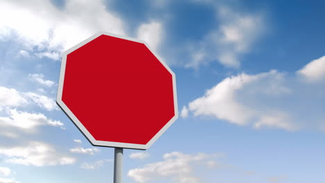 empty red road sign over cloudy sky