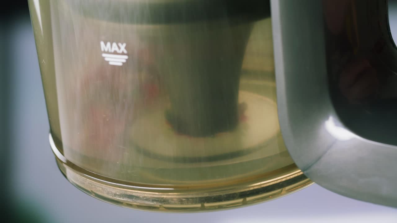 Dust and Debris Swirling Inside Vacuum Cleaner Dustbin