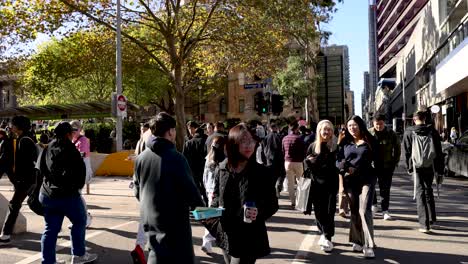 people crossing street in melbourne, australia