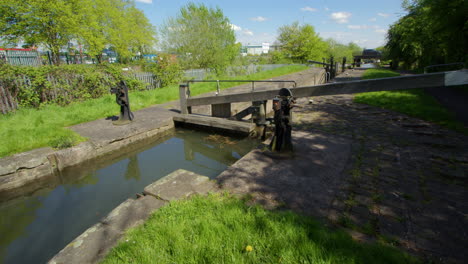 wide shot looking down a narrow canal lock at stret lock on the chesterfield canal